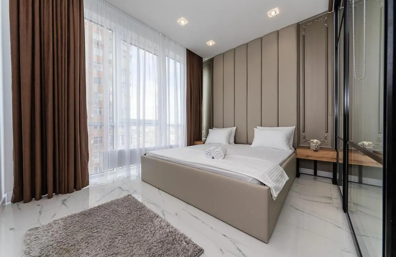 Apartmán Fashionable Apartments. Smartplaza Metro Minskaya. Obolon Kyjev