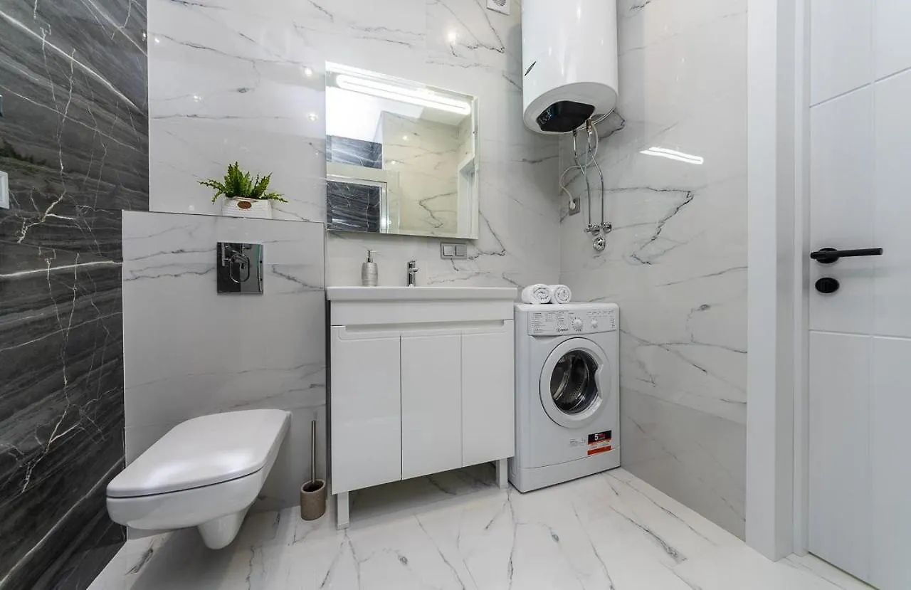 Apartmán Fashionable Apartments. Smartplaza Metro Minskaya. Obolon Kyjev
